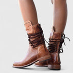Studded lace-up mid-calf leather boots with block heel