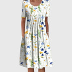 Elegant round neck layered printed dress in yellow floral print