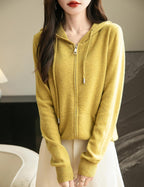 Women's warm merino wool zip up hooded cardigan with pockets in mustard