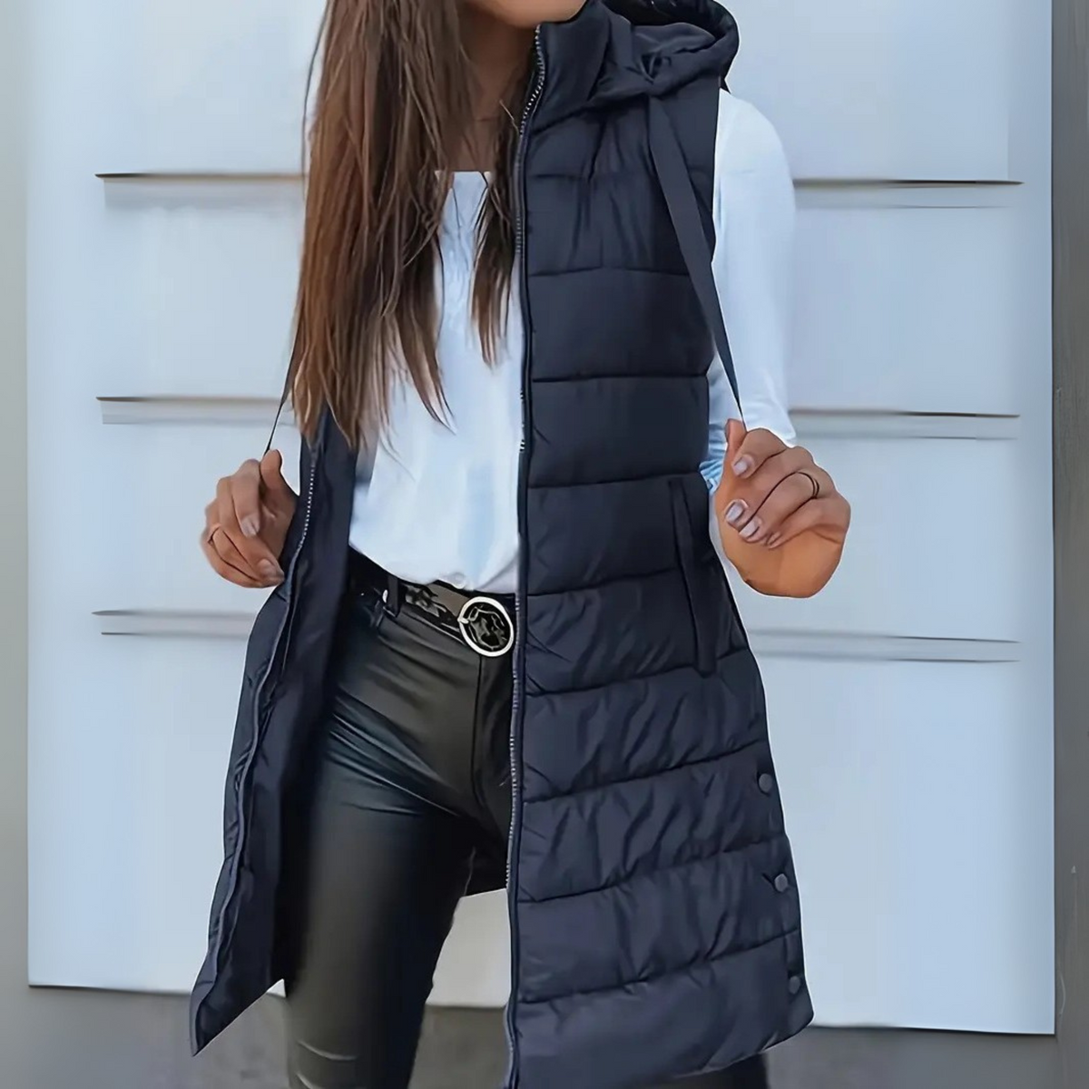 Long quilted hooded vest in navy blue