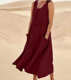 Cotton women's dress featuring a relaxed fit, stylish pockets, and a comfortable design, perfect for casual outings or everyday wear. 5