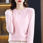 Women's adorable oversized knit sweater for fall and winter in pale pink