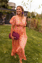 Floral print long summer dress featuring a defined waist design, perfect for warm weather outings and casual events. 1