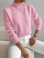Women's warm soft knit turtleneck sweater in light pink