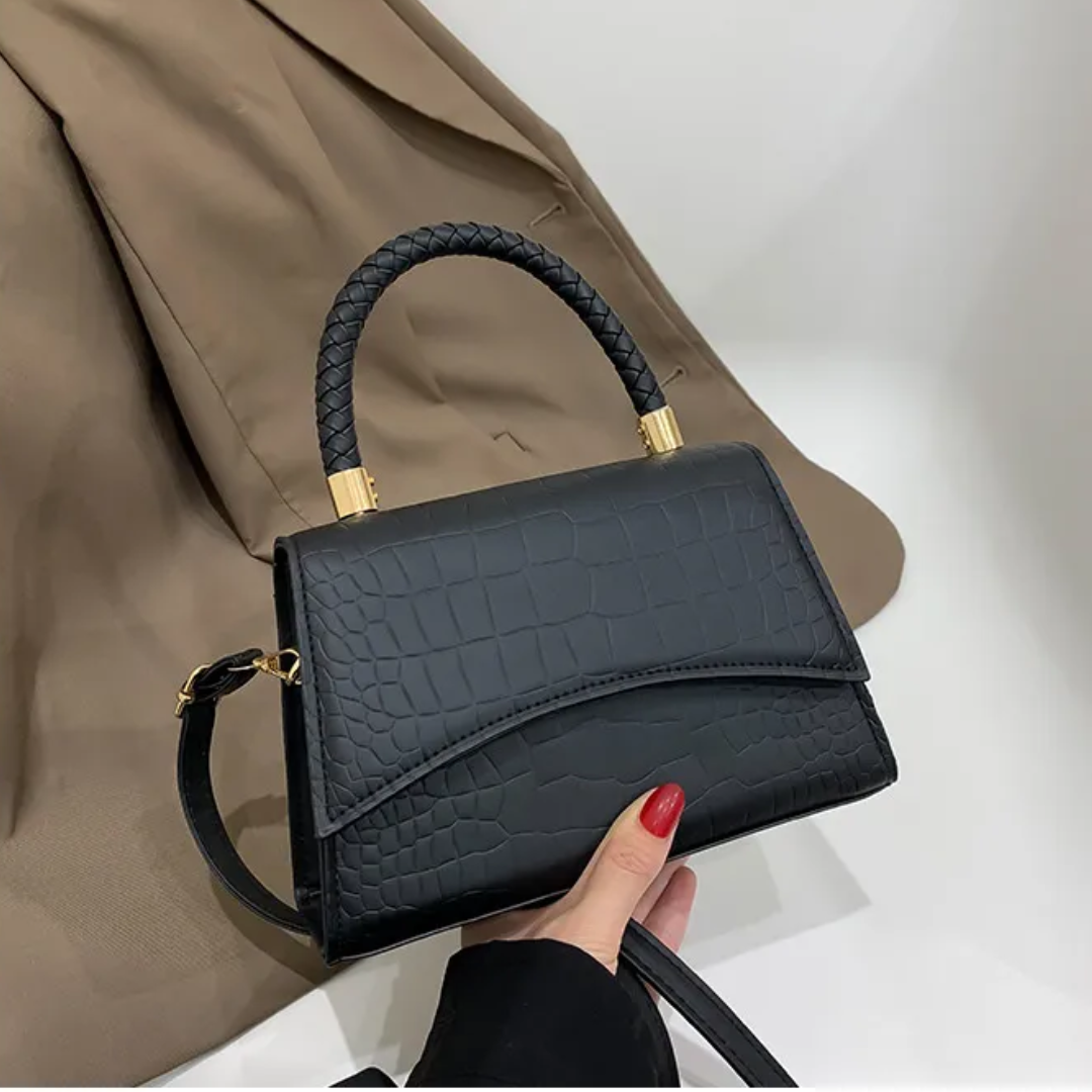 Stylish PU leather handbag featuring a top handle and a detachable crossbody strap, perfect for versatile wear and everyday use. 0