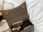 Stylish PU leather handbag featuring a top handle and a detachable crossbody strap, perfect for versatile wear and everyday use. 6
