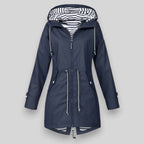 Women's sleek waterproof rain jacket with adjustable hood in navy blue