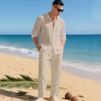 Men's business casual outfit featuring a lightweight linen shirt and matching trousers, perfect for warm weather and professional settings. 1