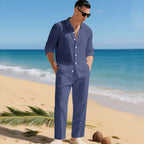 Men's business casual outfit featuring a lightweight linen shirt and matching trousers, perfect for warm weather and professional settings. 11
