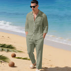 Men's business casual outfit featuring a lightweight linen shirt and matching trousers, perfect for warm weather and professional settings. 7