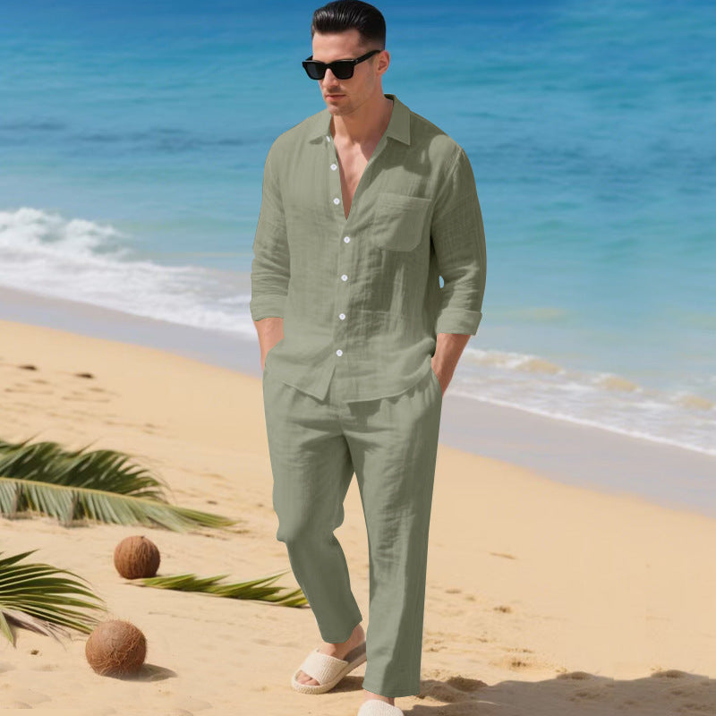 Men's business casual outfit featuring a lightweight linen shirt and matching trousers, perfect for warm weather and professional settings. 7