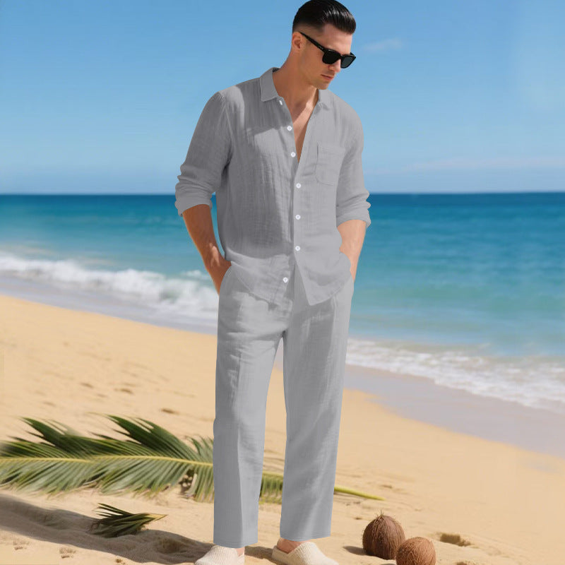 Men's business casual outfit featuring a lightweight linen shirt and matching trousers, perfect for warm weather and professional settings. 9