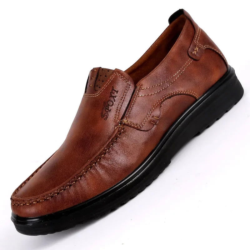 Men's casual leather loafers featuring a non-slip sole, designed for comfort and everyday wear, perfect for versatile styling. 1