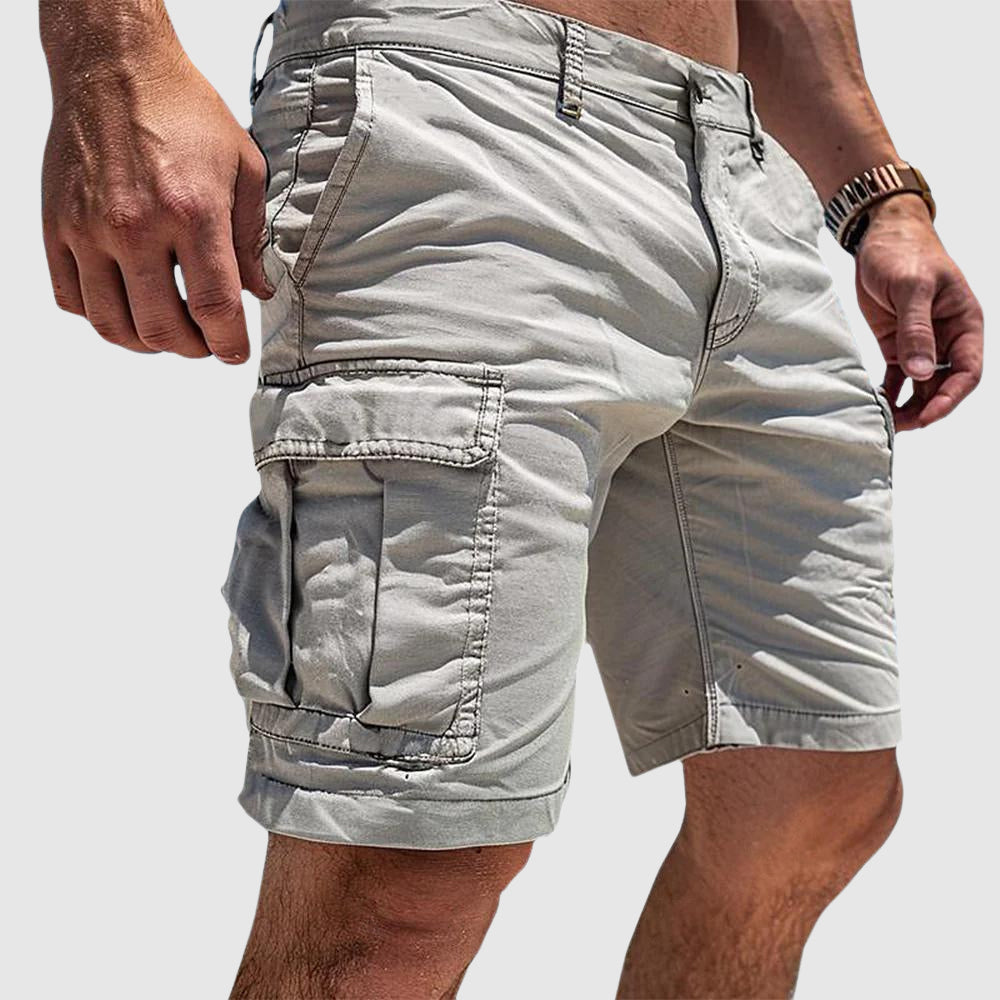 Men's relaxed fit knee-length cargo shorts in khaki, ideal for casual wear with multiple pockets for convenience and comfort. 1