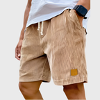 Men's relaxed fit textured summer shorts in a light color, perfect for casual occasions. Featuring a comfortable waistband and stylish design, ideal for warm weather outings 2