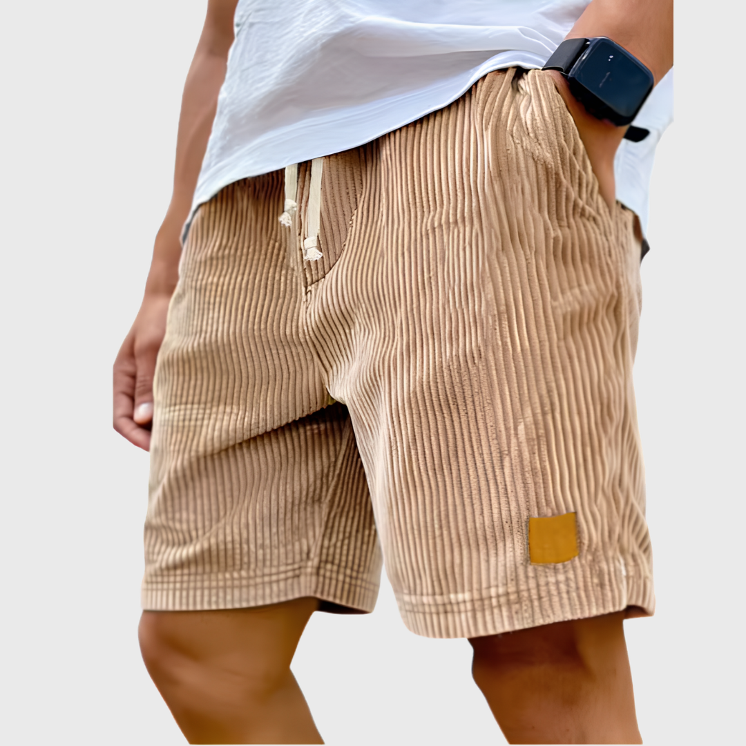 Men's relaxed fit textured summer shorts in a light color, perfect for casual occasions. Featuring a comfortable waistband and stylish design, ideal for warm weather outings 2