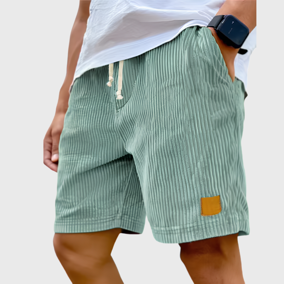 Men's relaxed fit textured summer shorts in a light color, perfect for casual occasions. Featuring a comfortable waistband and stylish design, ideal for warm weather outings 3