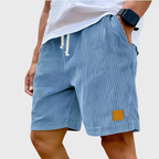 Men's relaxed fit textured summer shorts in a light color, perfect for casual occasions. Featuring a comfortable waistband and stylish design, ideal for warm weather outings 4