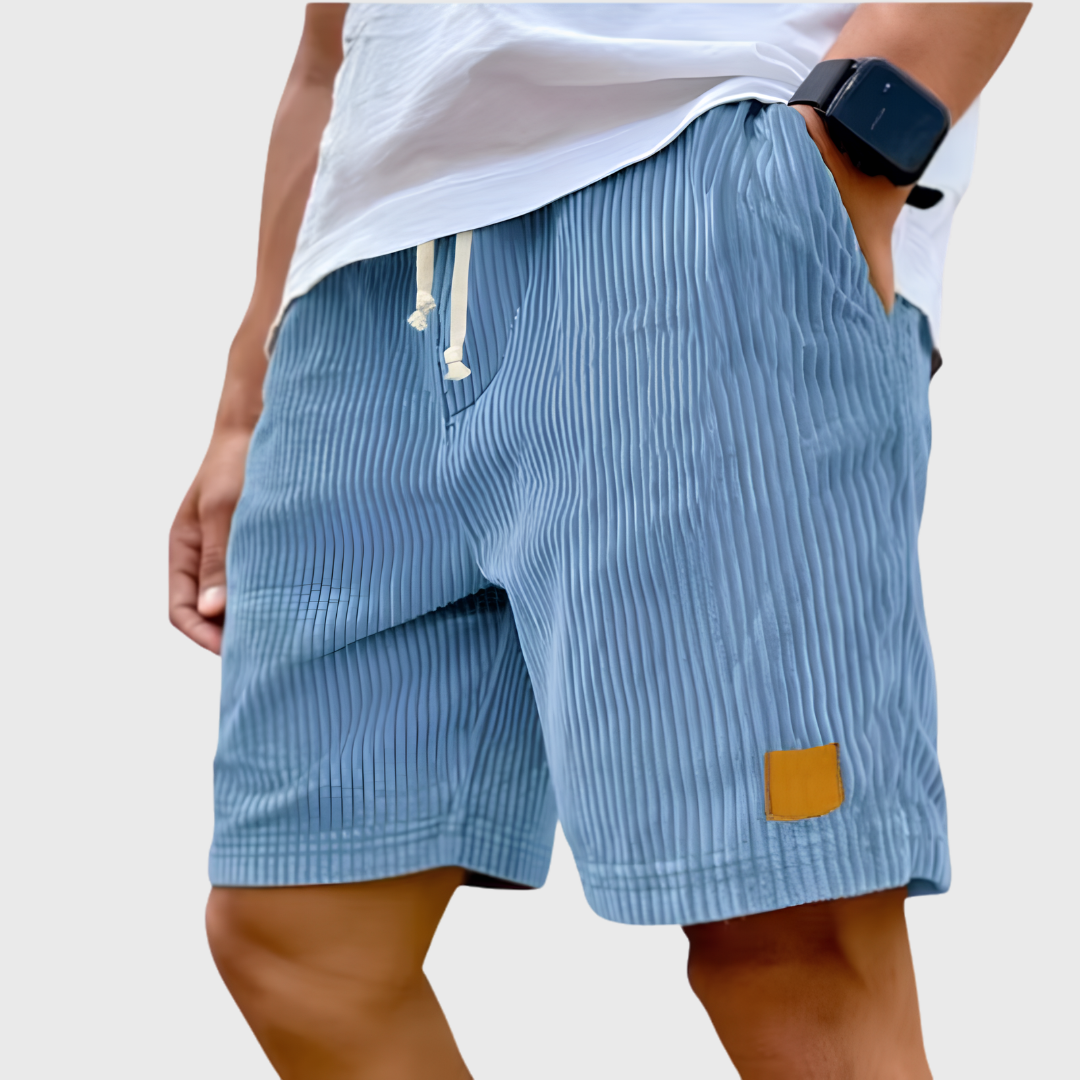 Men's relaxed fit textured summer shorts in a light color, perfect for casual occasions. Featuring a comfortable waistband and stylish design, ideal for warm weather outings 4