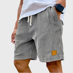 Men's relaxed fit textured summer shorts in a light color, perfect for casual occasions. Featuring a comfortable waistband and stylish design, ideal for warm weather outings 6