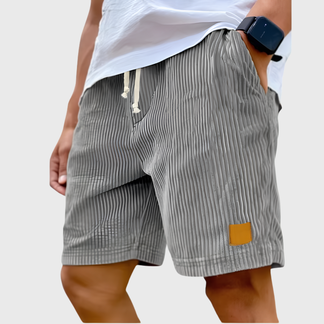 Men's relaxed fit textured summer shorts in a light color, perfect for casual occasions. Featuring a comfortable waistband and stylish design, ideal for warm weather outings 6