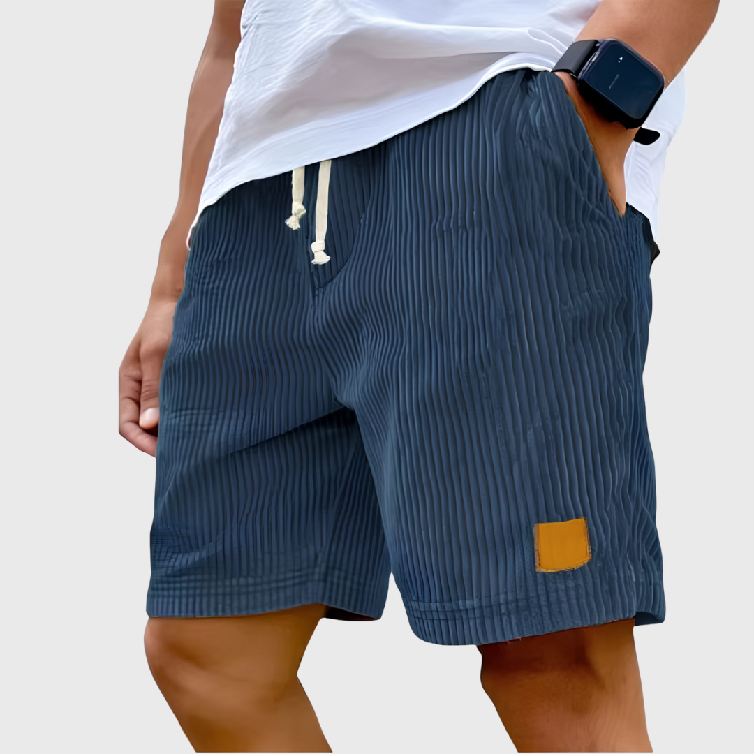 Men's relaxed fit textured summer shorts in a light color, perfect for casual occasions. Featuring a comfortable waistband and stylish design, ideal for warm weather outings 7