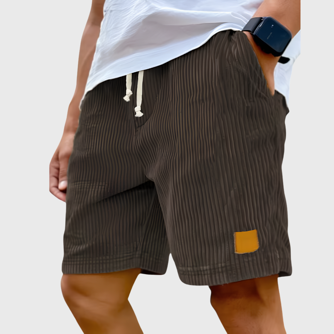 Men's relaxed fit textured summer shorts in a light color, perfect for casual occasions. Featuring a comfortable waistband and stylish design, ideal for warm weather outings 8