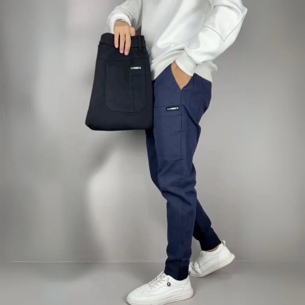 Men's slim fit cargo joggers featuring ribbed cuffs, designed for stylish casual wear, showcasing a modern silhouette and practical pockets. 2