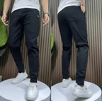 Men's slim fit cargo joggers featuring ribbed cuffs, designed for stylish casual wear, showcasing a modern silhouette and practical pockets. 3