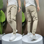Men's slim fit cargo joggers featuring ribbed cuffs, designed for stylish casual wear, showcasing a modern silhouette and practical pockets. 4