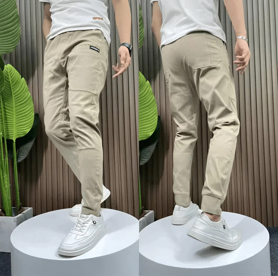 Men's slim fit cargo joggers featuring ribbed cuffs, designed for stylish casual wear, showcasing a modern silhouette and practical pockets. 4