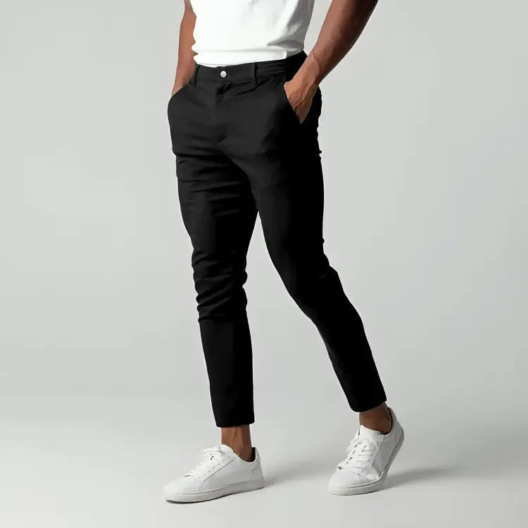 Men's tapered chino pants designed for versatility, perfect for work or casual outings, featuring a modern fit and comfortable fabric. 0