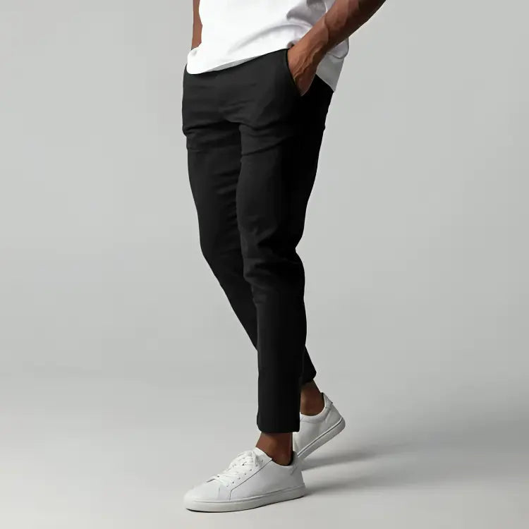 Men's tapered chino pants designed for versatility, perfect for work or casual outings, featuring a modern fit and comfortable fabric. 3