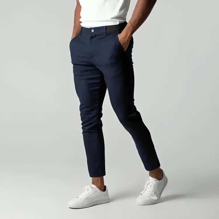 Men's tapered chino pants designed for versatility, perfect for work or casual outings, featuring a modern fit and comfortable fabric. 4