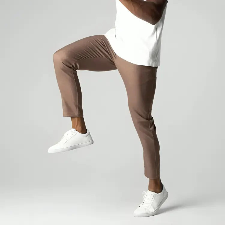 Men's tapered chino pants designed for versatility, perfect for work or casual outings, featuring a modern fit and comfortable fabric. 5