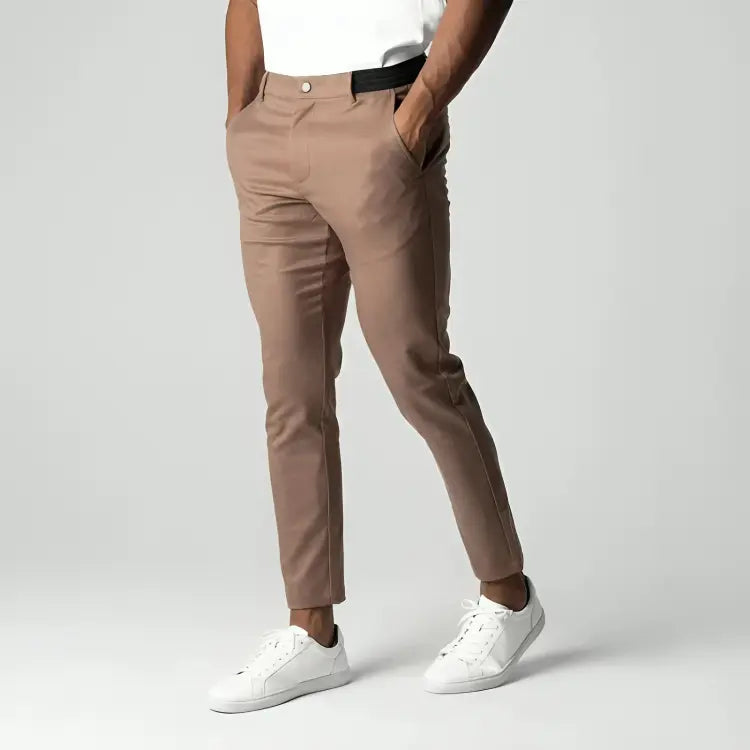 Men's tapered chino pants designed for versatility, perfect for work or casual outings, featuring a modern fit and comfortable fabric. 7