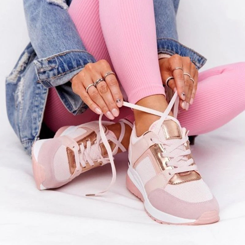 Orthopedic women's sneaker featuring arch support and cushioning for enhanced comfort and stability during daily activities. 1