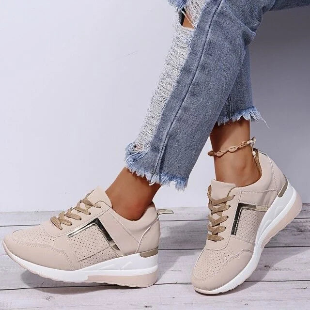 Orthopedic women's sneaker featuring arch support and cushioning for enhanced comfort and stability during daily activities. 5