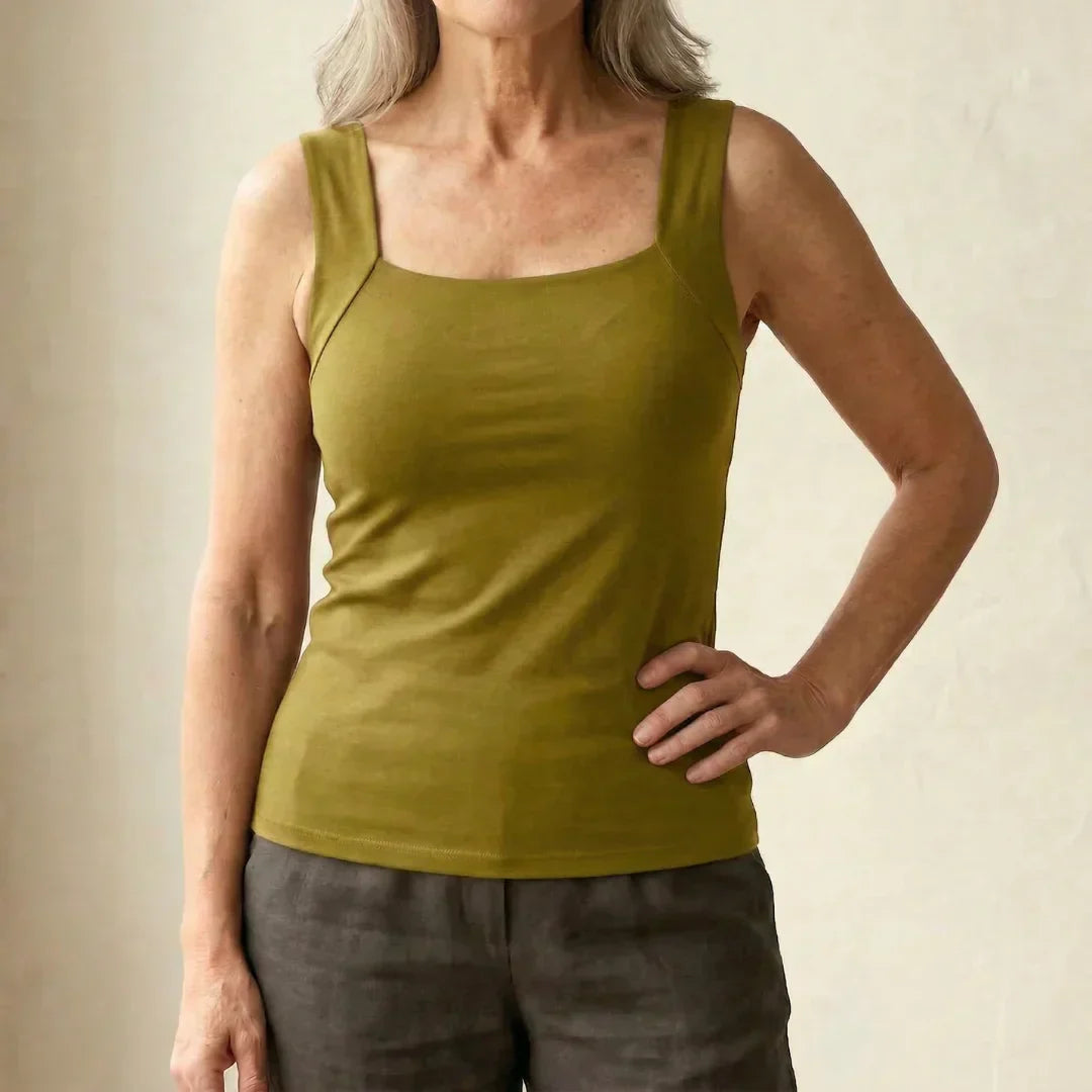 Women’s tank top featuring a built-in bra, designed with breathable fabric for ultimate comfort and support during workouts or casual wear. 15