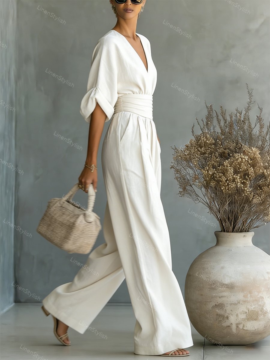 V-Neck jumpsuit for women featuring a tailored fit and luxurious silk-touch fabric, perfect for elegant occasions and stylish outings. 3