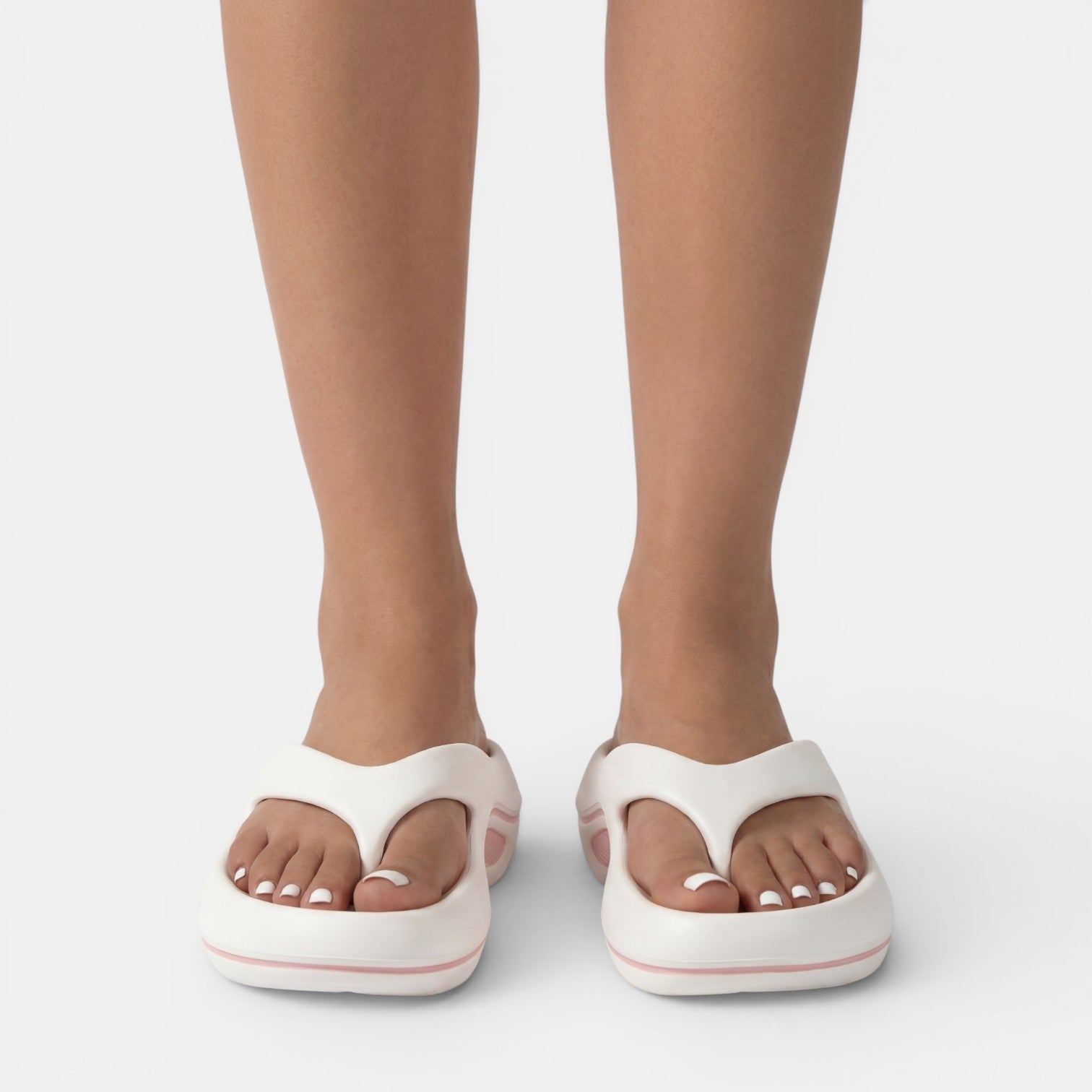 Women's anatomical flip flops designed for summer beach casual wear, featuring ergonomic footbeds for comfort and stylish designs in vibrant colors. 1