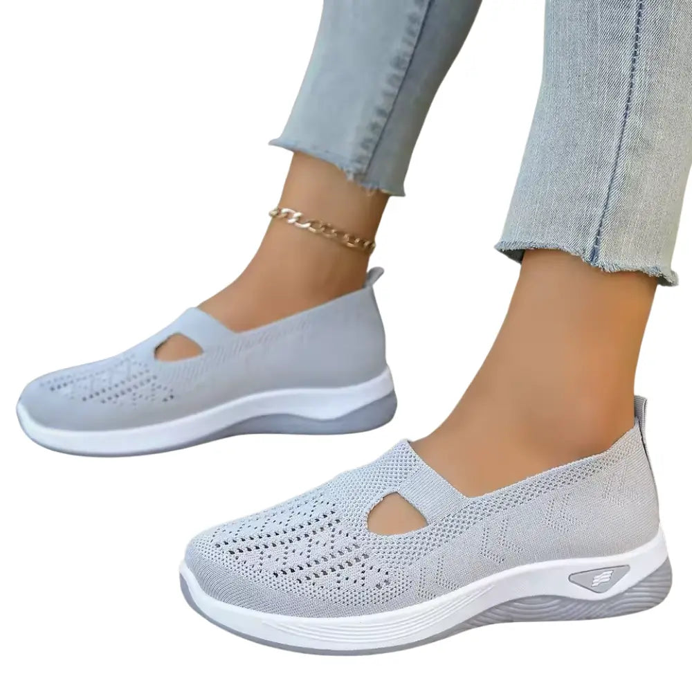 Women's anatomical slip-on sneakers designed for all-day comfort, featuring a sleek design, cushioned insoles, and breathable materials, perfect for casual outings and 10