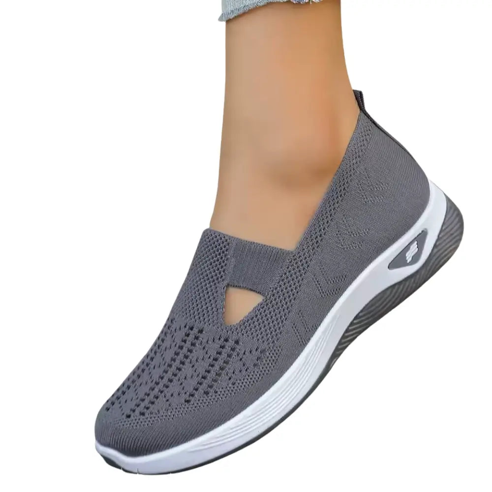 Women's anatomical slip-on sneakers designed for all-day comfort, featuring a sleek design, cushioned insoles, and breathable materials, perfect for casual outings and 11