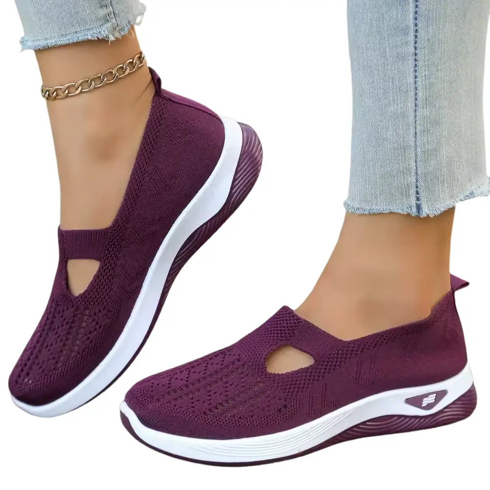 Women's anatomical slip-on sneakers designed for all-day comfort, featuring a sleek design, cushioned insoles, and breathable materials, perfect for casual outings and 12