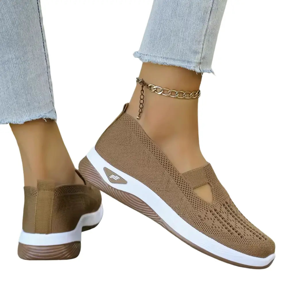 Women's anatomical slip-on sneakers designed for all-day comfort, featuring a sleek design, cushioned insoles, and breathable materials, perfect for casual outings and 13