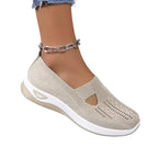 Women's anatomical slip-on sneakers designed for all-day comfort, featuring a sleek design, cushioned insoles, and breathable materials, perfect for casual outings and 14