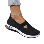 Women's anatomical slip-on sneakers designed for all-day comfort, featuring a sleek design, cushioned insoles, and breathable materials, perfect for casual outings and 9