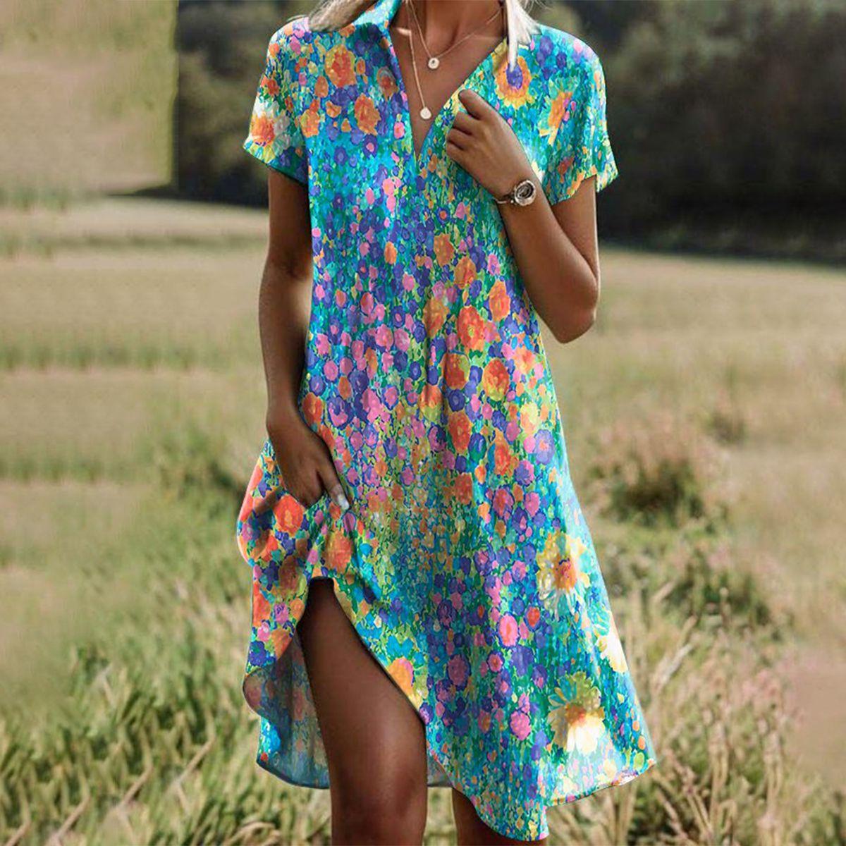 Plus size women's boho maxi dress in a loose fit, perfect for summer casual wear, featuring vibrant patterns and a flowy silhouette. 0