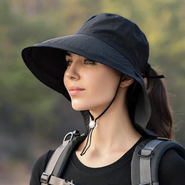 Women's breathable sun hat designed for fishing, hiking, and outdoor activities, featuring a wide brim for sun protection and lightweight fabric for comfort. 0