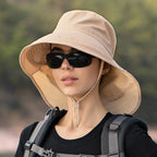 Women's breathable sun hat designed for fishing, hiking, and outdoor activities, featuring a wide brim for sun protection and lightweight fabric for comfort. 2